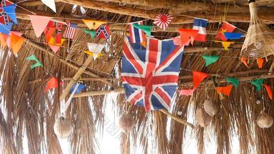 装饰国家旗帜国家挂字符串木热带平房异国情调的拉斯塔酒吧室内夏天海滩房子KOHPhangan岛泰国
